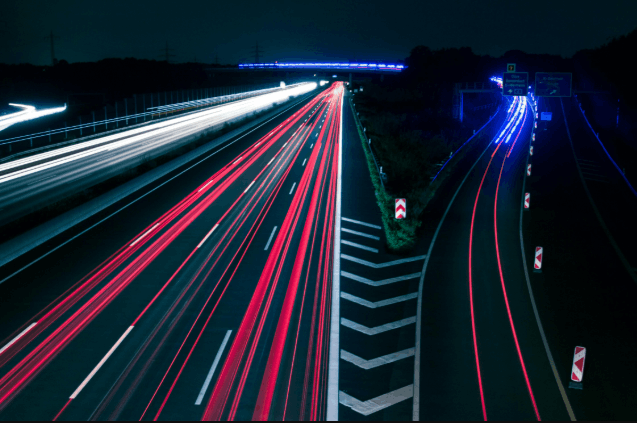 Where are amber reflective studs found on a motorway