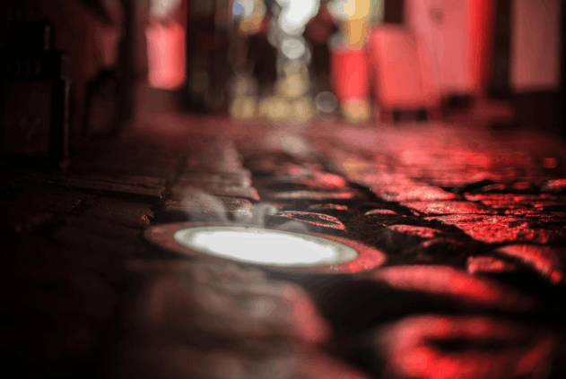 Who introduced reflective studs on a motorway
